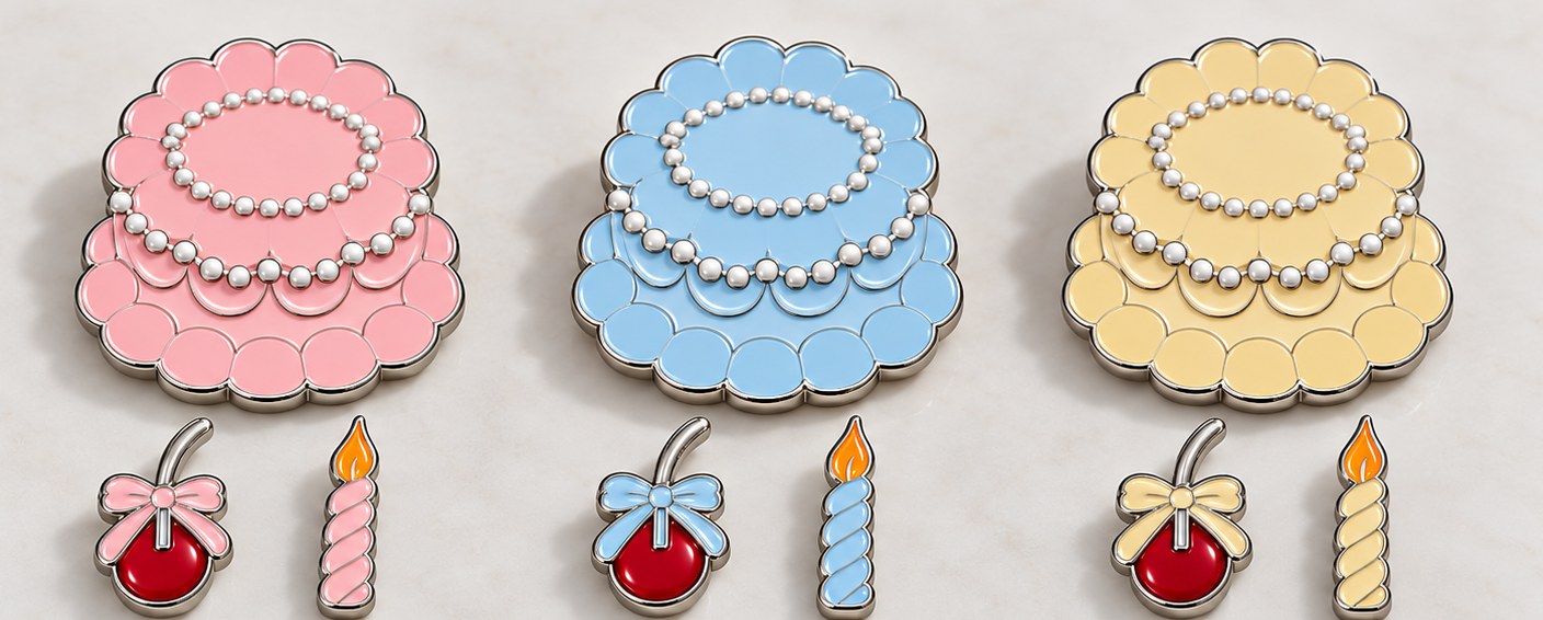 Preproduction concept of pastel cake pins with matching cherry and candle toppers