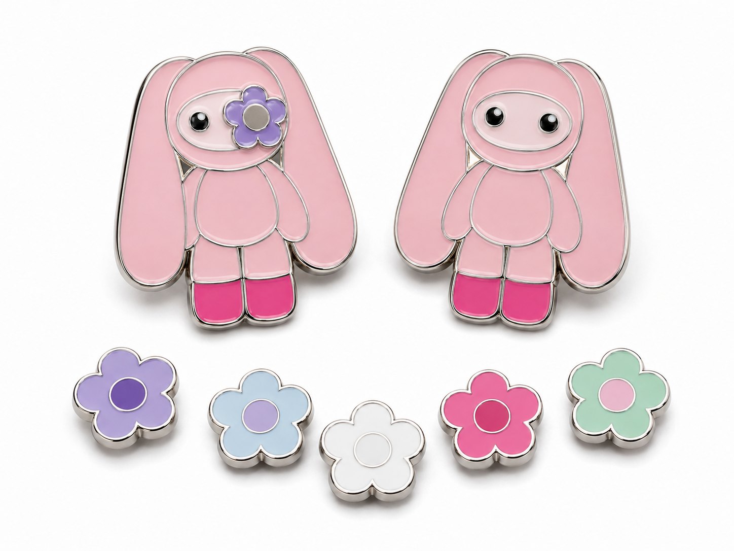 Illustration of pink swappable-eye Juju pins and interchangeable flower eyes